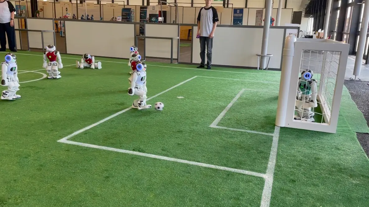 From the annual RoboCup
Standard Platform League (SPL) competition, a research competition that aims to advance the capabilities of robotics in challenging, real-time domains.